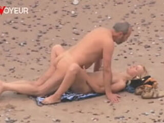 Beach spycam. Elderly fellow nailing sizzling cougar on the ocean shore