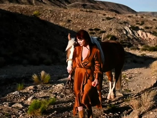 Sandy-haired cougar liking the outdoors