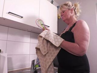 Real mature mummy penetrates her donk and vulva in the kitchen