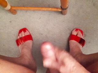 Marzia ejaculates in crimson in crimson stilettos and crimson Toenails